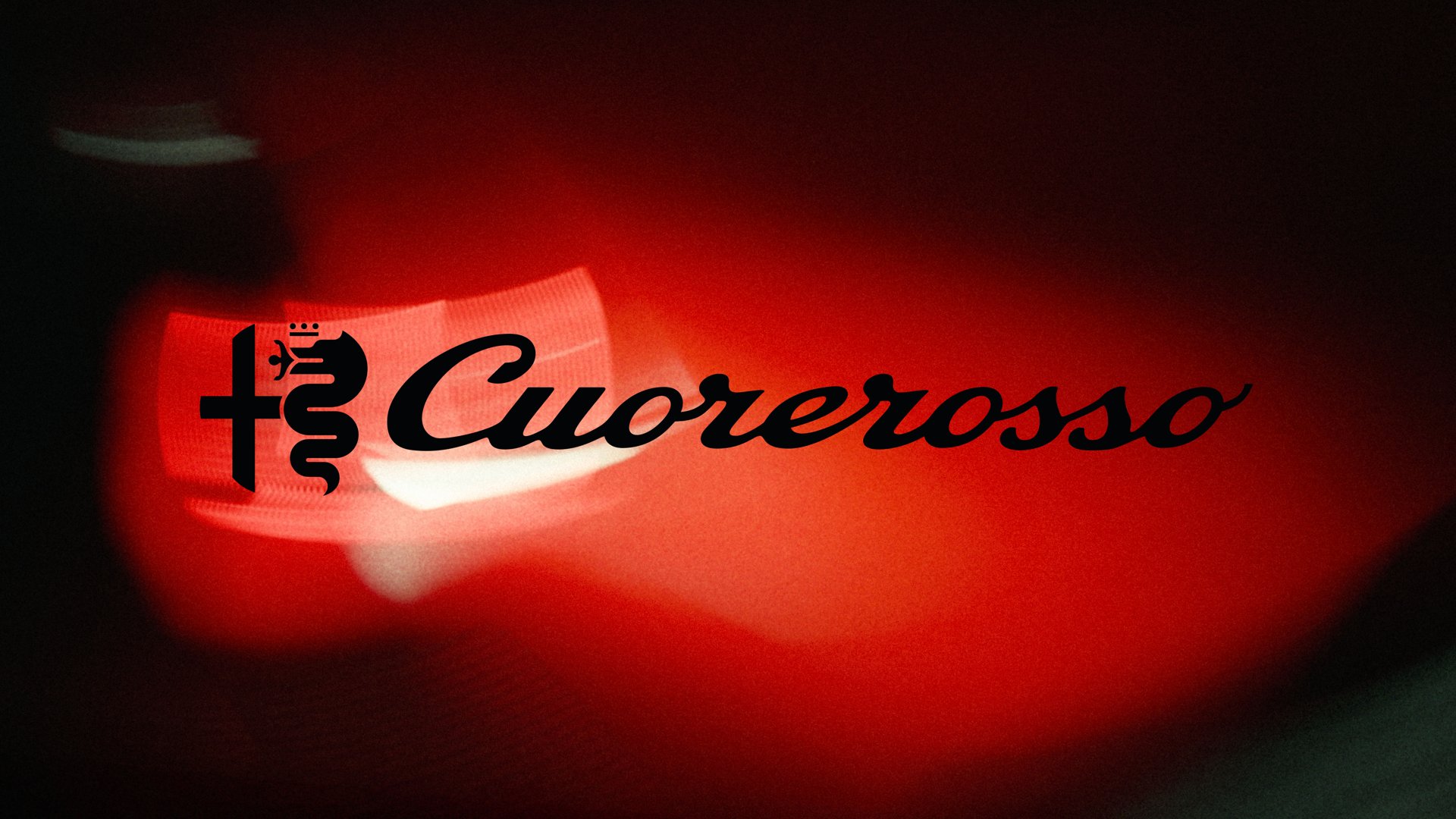 El logotipo del Alfa Romeo Cuorerosso sobre la carrocería roja del concept