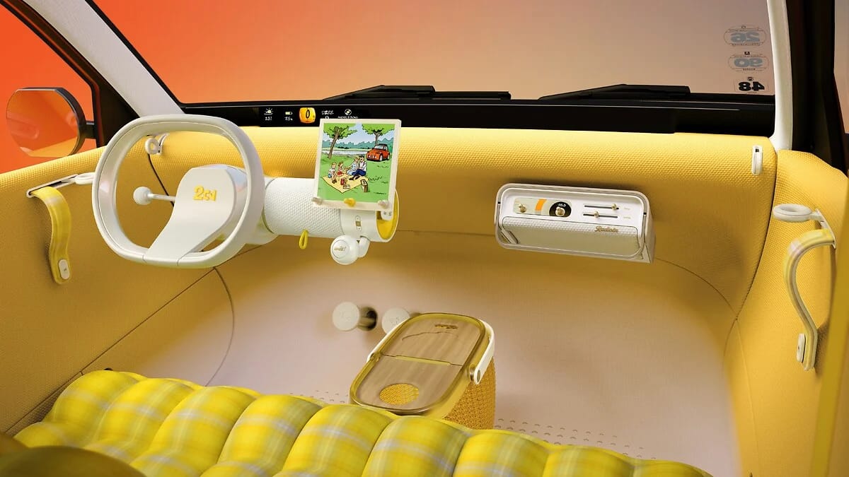 Interior del Citroën 2 CV Concept con asientos de cuadros amarillos